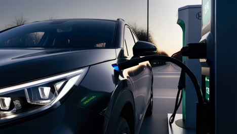 electric vehicle charging at a station