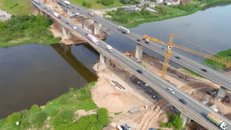 Building-of-A1-middle-bridge-in-Kaunas-city,-aerial-panoramic-view