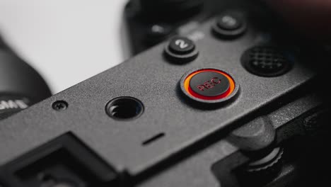 close-up view of the record button on the sony fx3, highlighting its design and tactile response for users