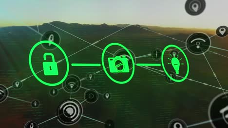 Animation-Eines-Netzwerks-Von-Mediensymbolen-über-Der-Landschaft-Bei-Sonnenuntergang