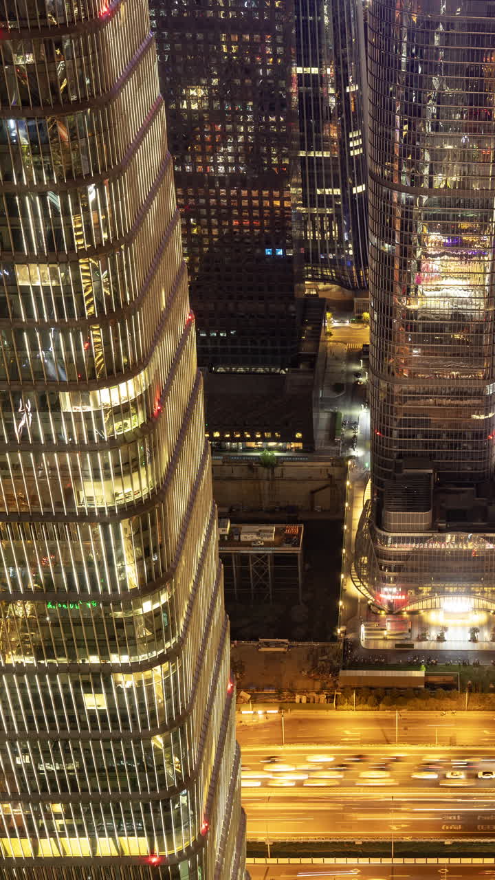 Timelapse of the Beijing city skyline from a high vantage point in vertical