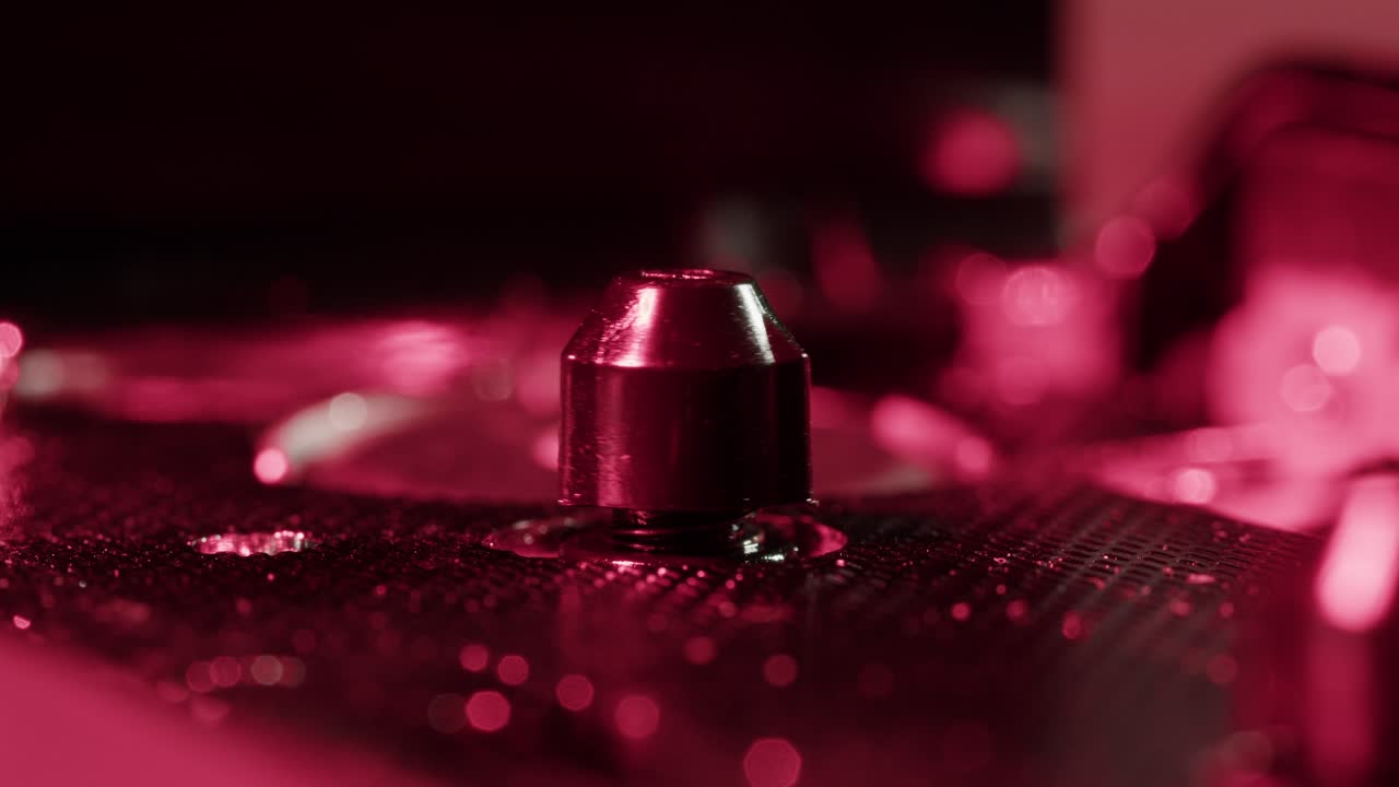 Close-up of a vintage audio cassette tape showing wear marks and magnetic tape reels in retro style.