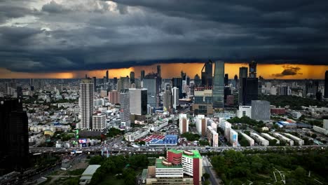 dramatic stormy sunset over bangkok city skyline