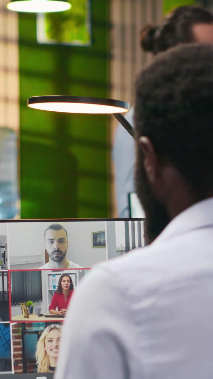 Vertical video Tech startup office team collaborating via videocall, doing brainstorming