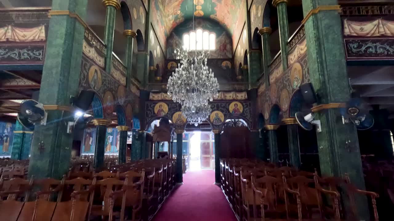 Inside The Byzantine Interior Of An Orthodox Church. Tilt-down Shot