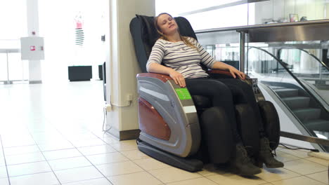 Woman-relaxing-in-massage-chair