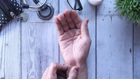 woman with wrist pain being examined by a doctor