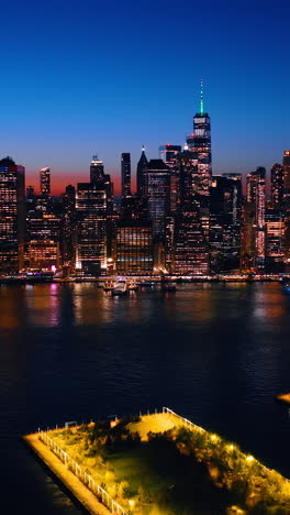 nightlife of new york city aerial view. manhattan street with night lights. vertical video