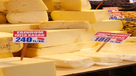 variety of turkish cheeses on display at a market