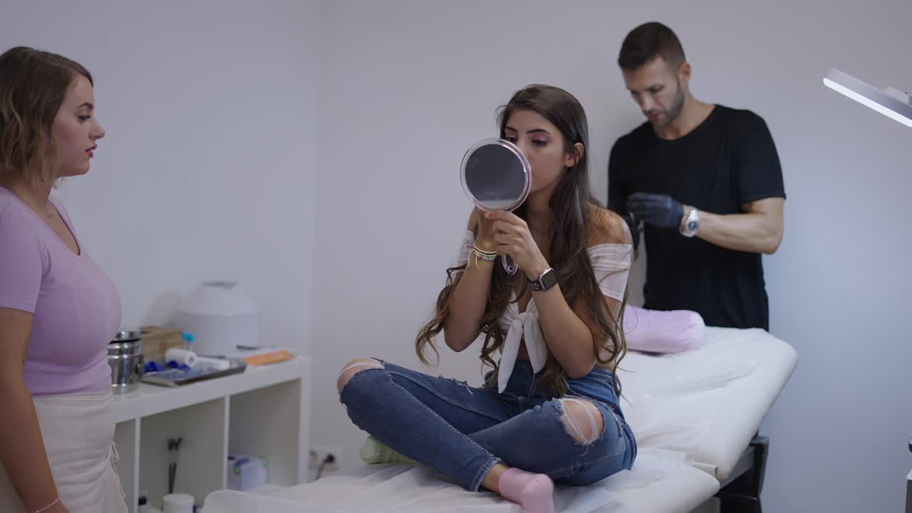 Client Consultation and Preparation at a Beauty Salon