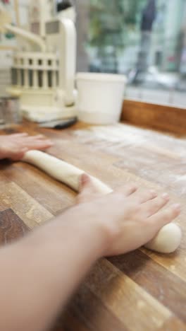 rolling out dough for bread