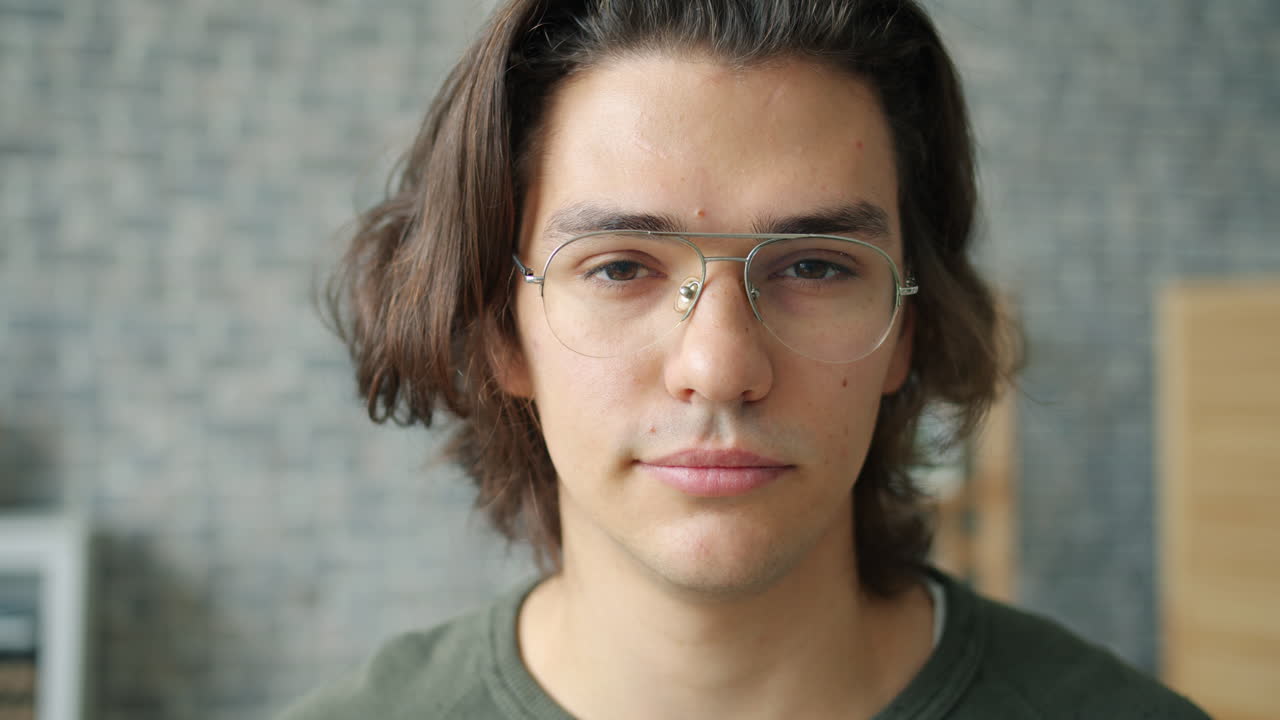 Young Man Wearing Glasses