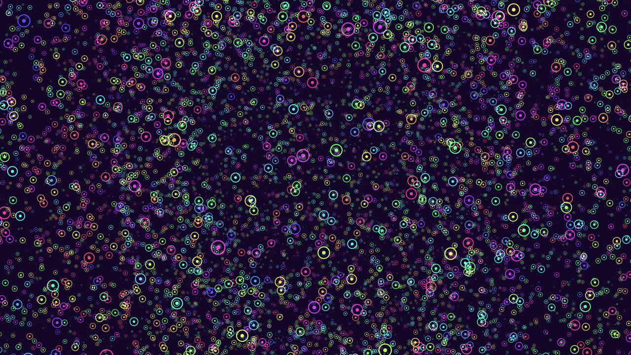 círculos coloridos en espiral vibrante en patrón sobre fondo negro