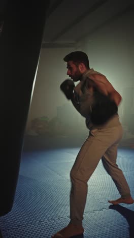 man training at the boxing gym