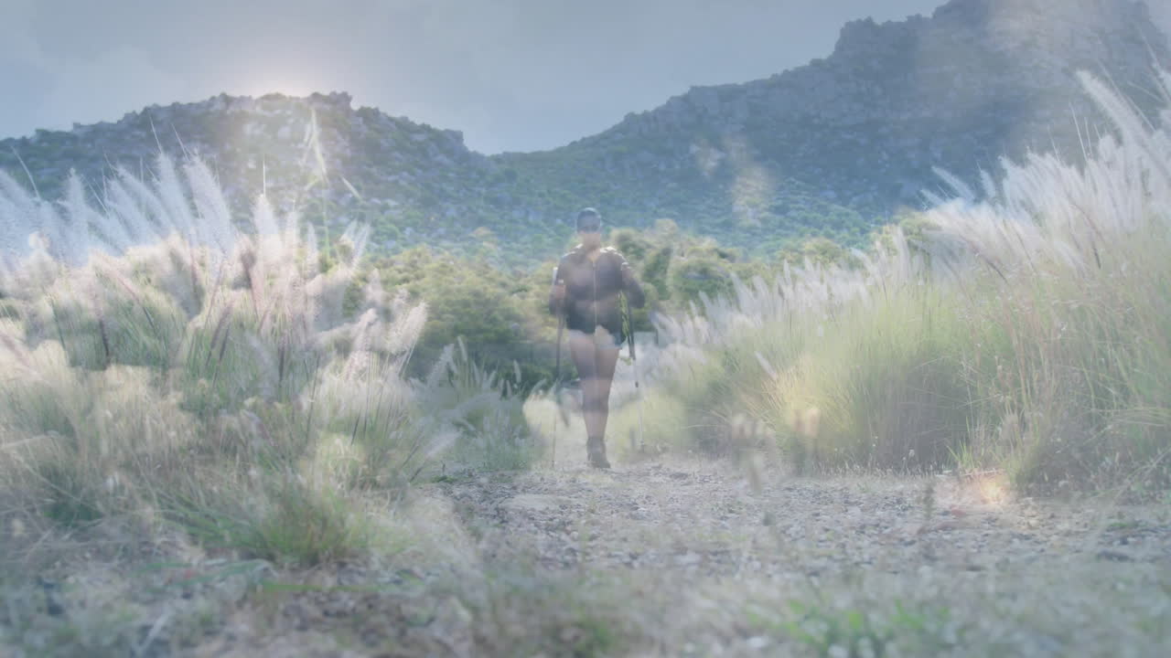 Female hiker trekking gravel trail with sunglasses in health animation, displaying data layers