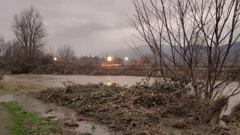 flooding on rural fields in canada, dolly forward view