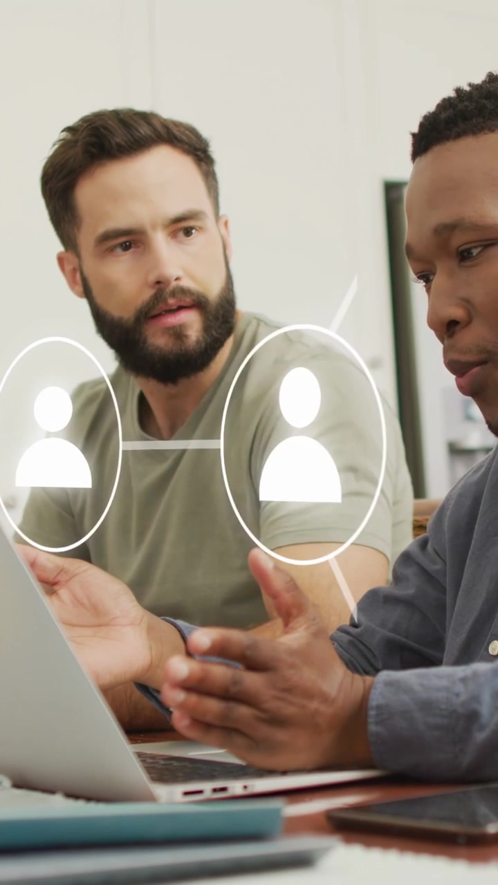 Vertical video: Speaker pointing at laptop and starting overlay linking team for tech collaboration
