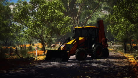tractor de excavadora en el bosque