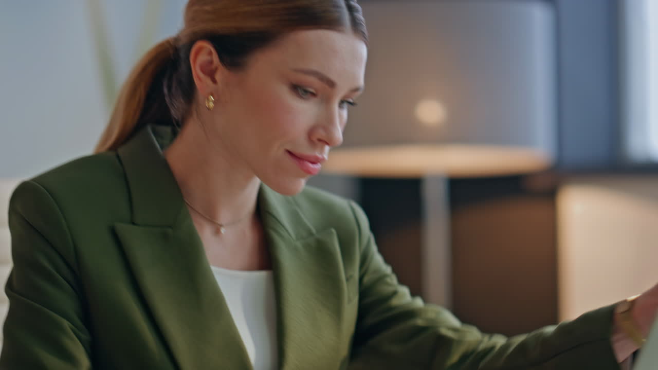 Closeup lady opening computer at office. Businesswoman started work at morning