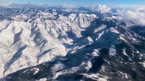 aerial of beautiful snowy montana mountain ranges