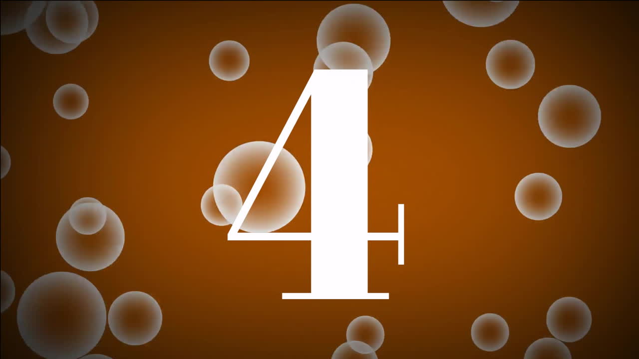 Number 5 animation over bubbles on orange background