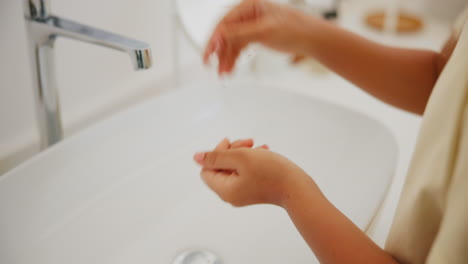 cleaning, hands and kid with soap in home learning