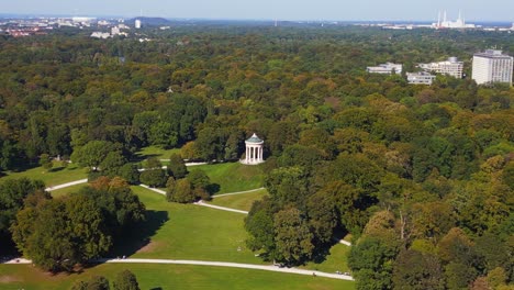 Majestic-aerial-top-view-flight-Monopteros
English-Garden-Munich-Germany-Bavarian,-summer-sunny-blue-sky-day-23