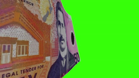 new zealand 50 dollar banknote details on green screen