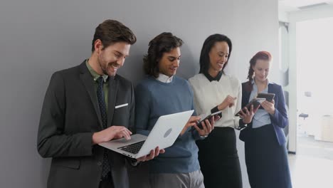 group of executives using laptop and digital tablet 4k