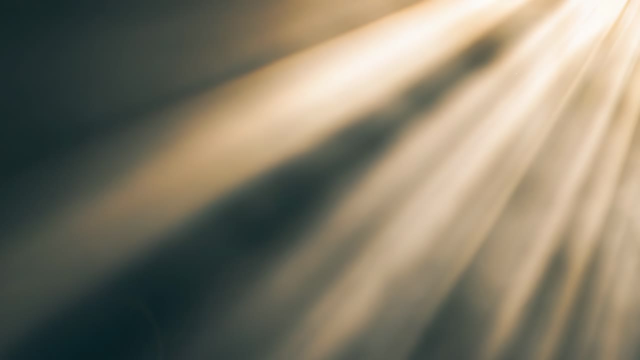 Abstract video background with soft, diagonal light beams creating a serene atmosphere