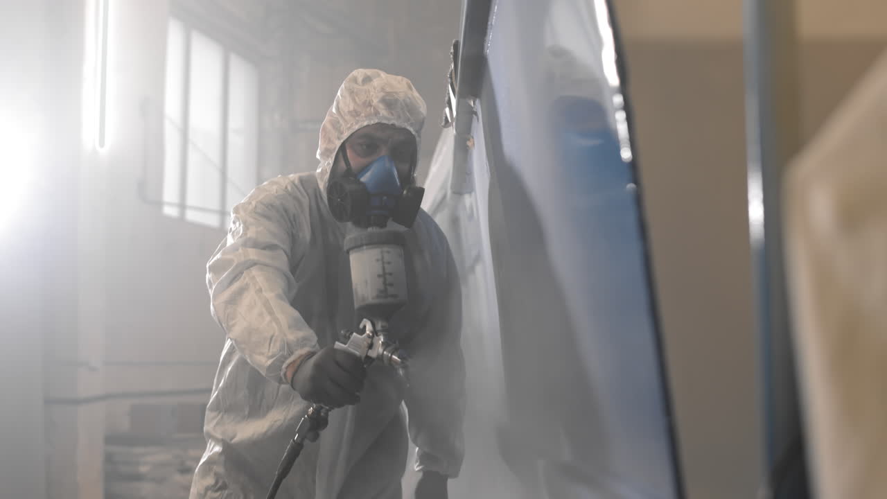 Worker Wearing Protection Using Airbrush