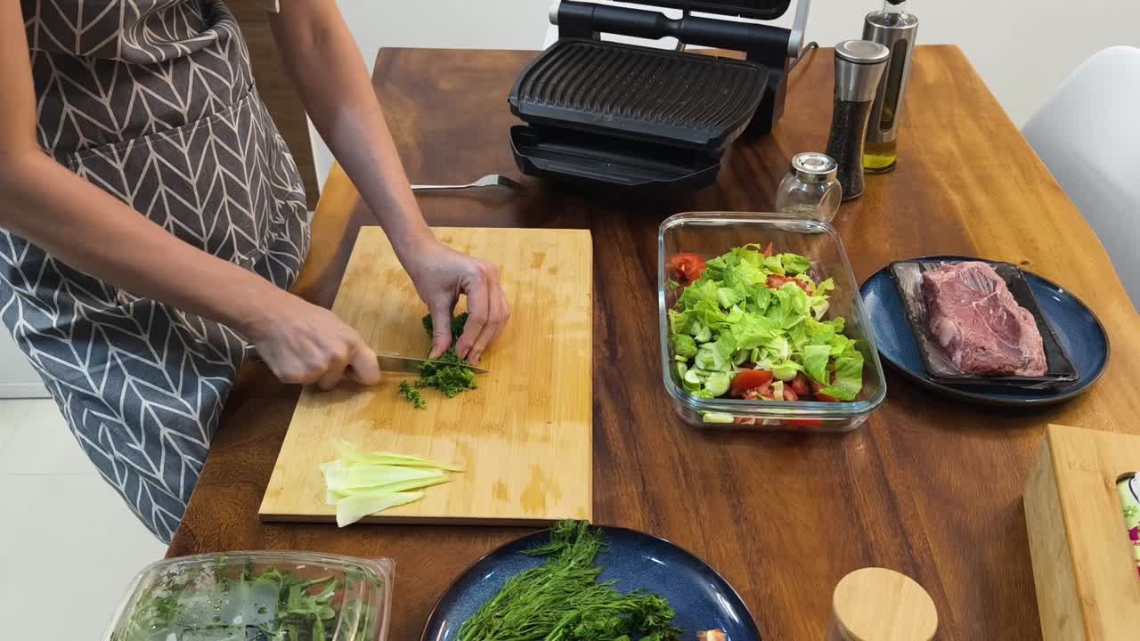 Preparing fresh vegetables for a sandwich