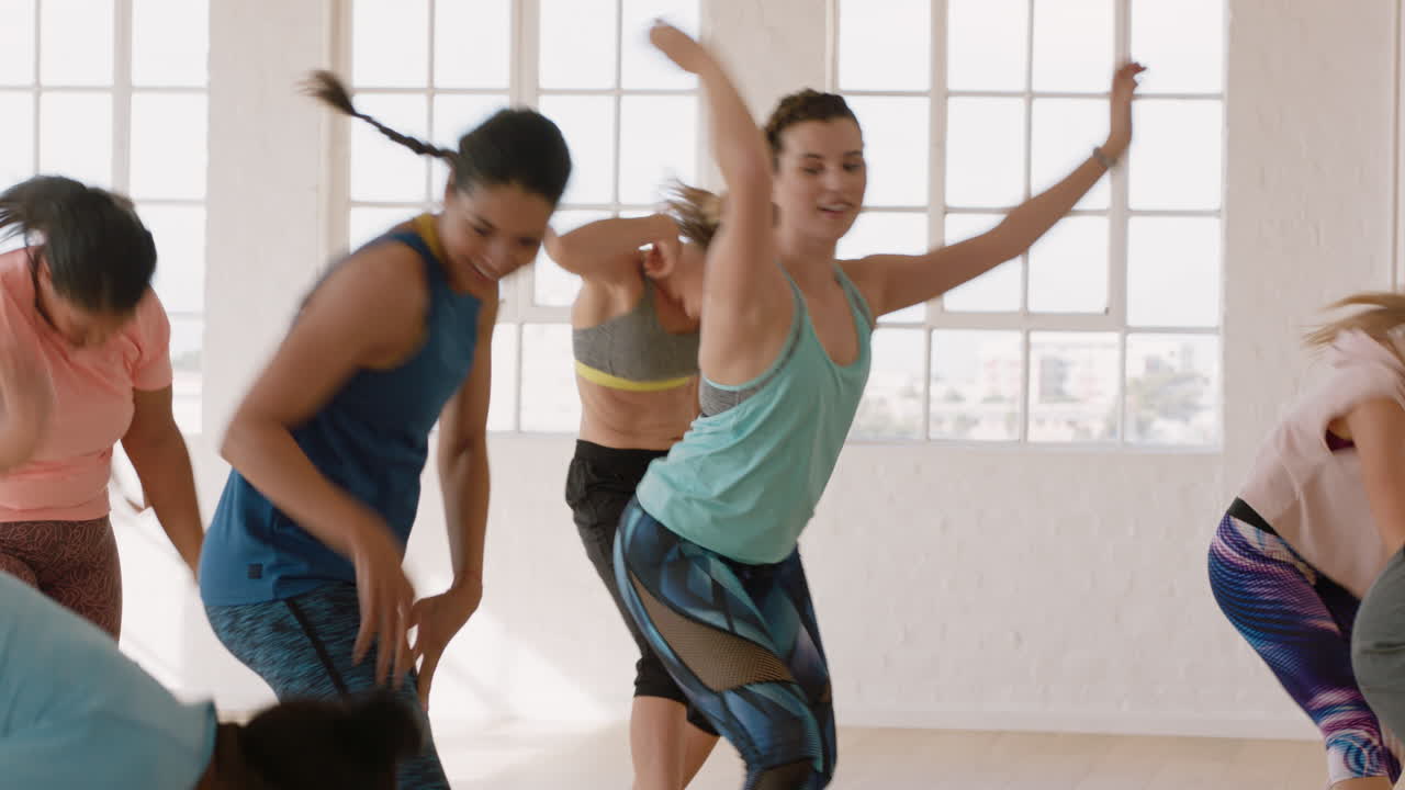 dance class instructor training group of multiracial people dancing practicing choreography moves having fun in fitness studio enjoying healthy active lifestyle