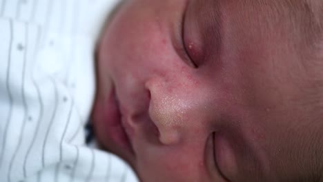 close up portrait of sleeping new born indian baby boy