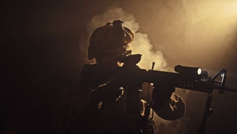 soldiers taking aim from rifle in the dark, smoke in background, military and army concept