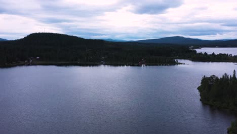 an aerial view of a sweden jukkasjärvi lake in summer near aurora camp kurravaara