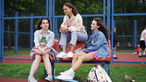 friends talking in the schoolyard