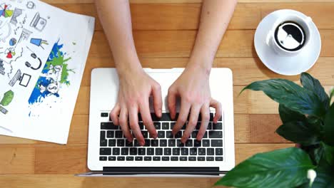 Woman-working-on-laptop-at-desk