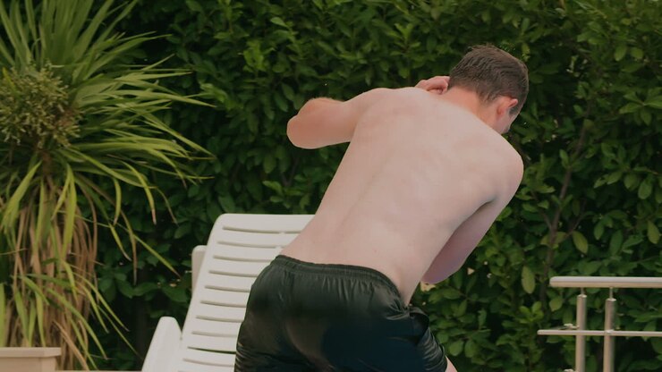 Man Jumping Into Swimming Pool 7
