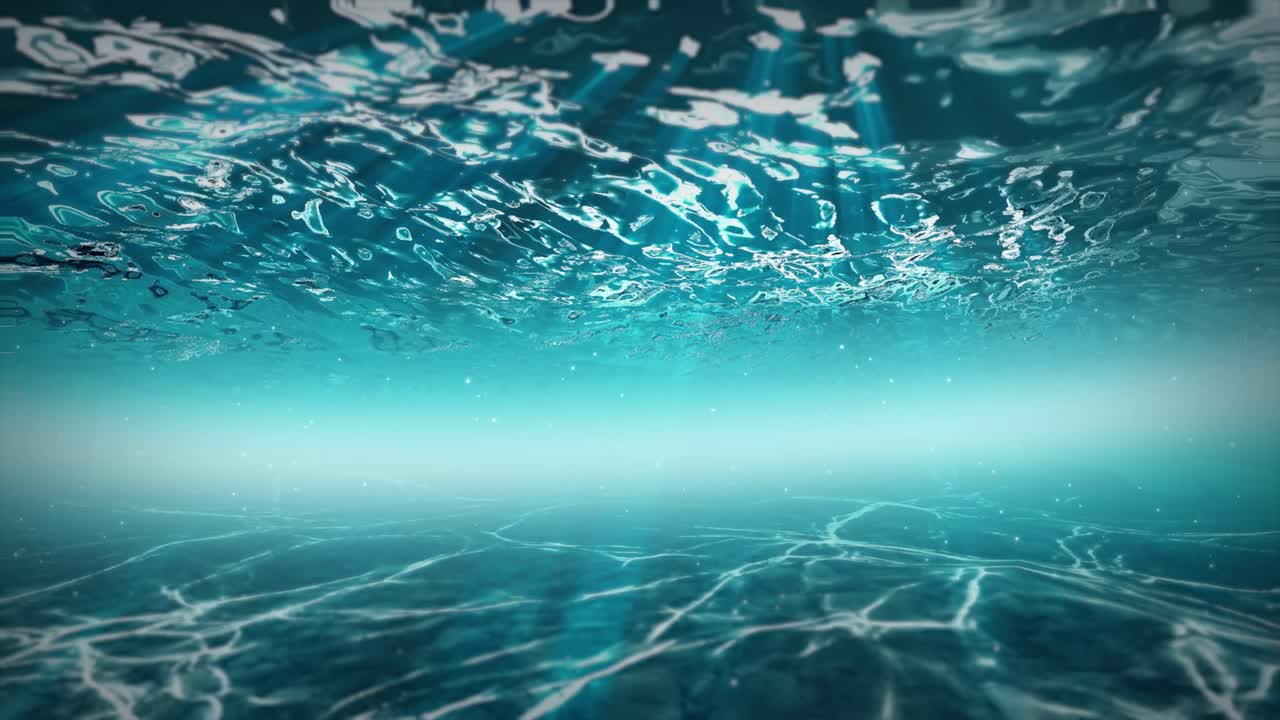 The image captures an underwater view with stunning rays of sunlight piercing through the ocean surface