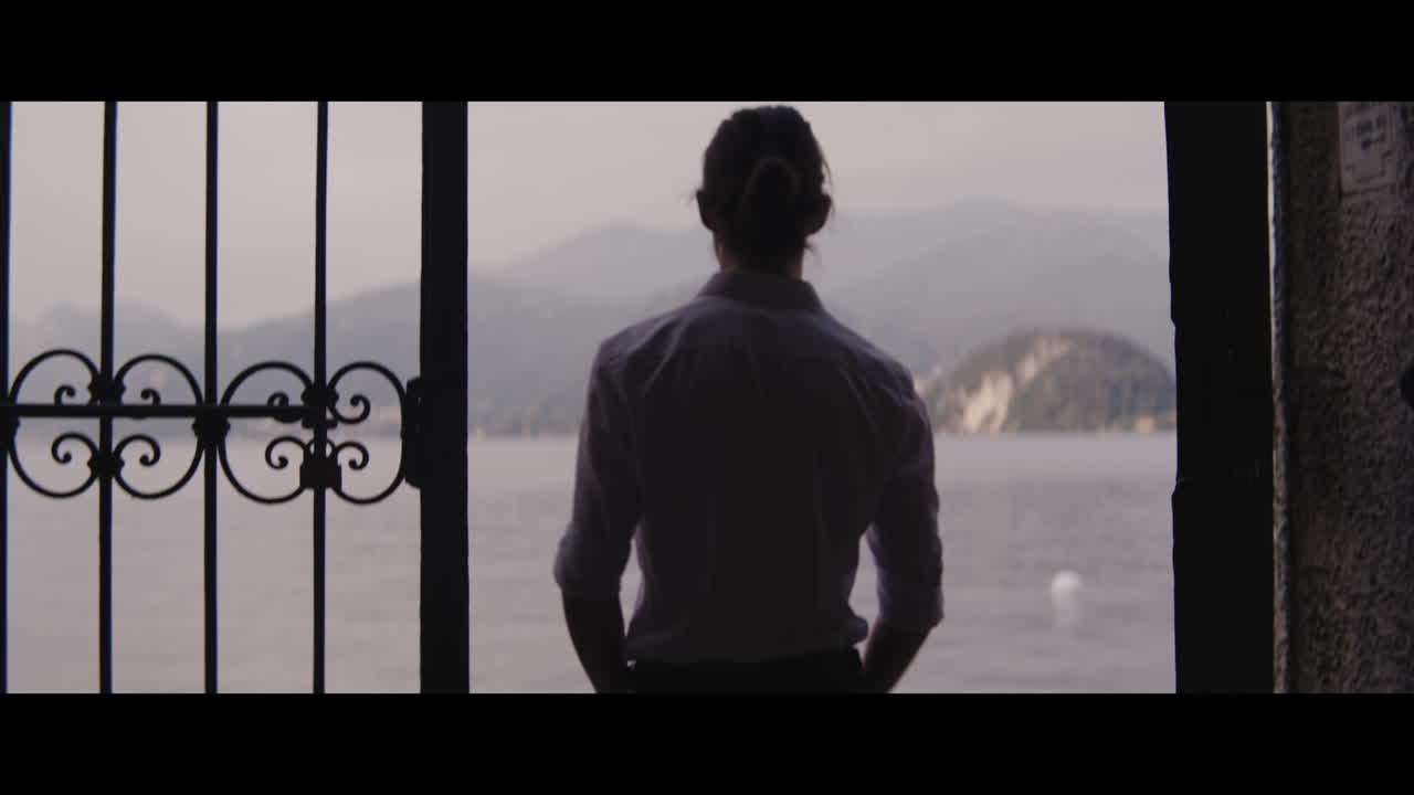 Man Standing at Lake Como