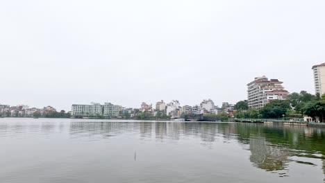 panoramic view of river and cityscape in hanoi