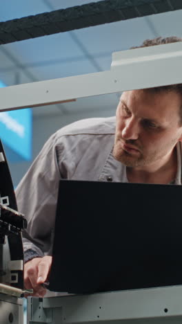 Technician Working on a Printing Press