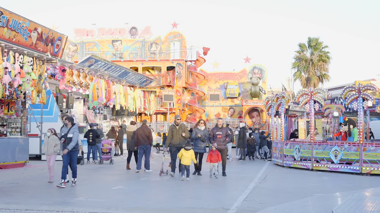 People enjoying an outdoor fair in winter