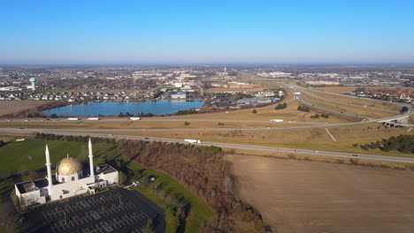 Perrysburg-township-and-massive-mosque-with-golden-dome-in-Ohio,-USA,-aerial-view