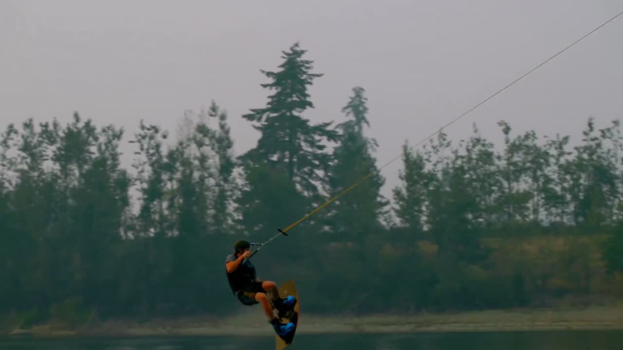 Man wakeboarding in the river 4k