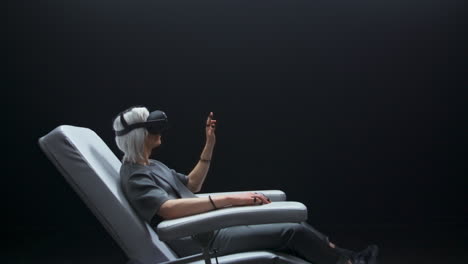 Haptic-sensors-gamer-arms-touching-interface-closeup.-Man-enjoying-metaverse