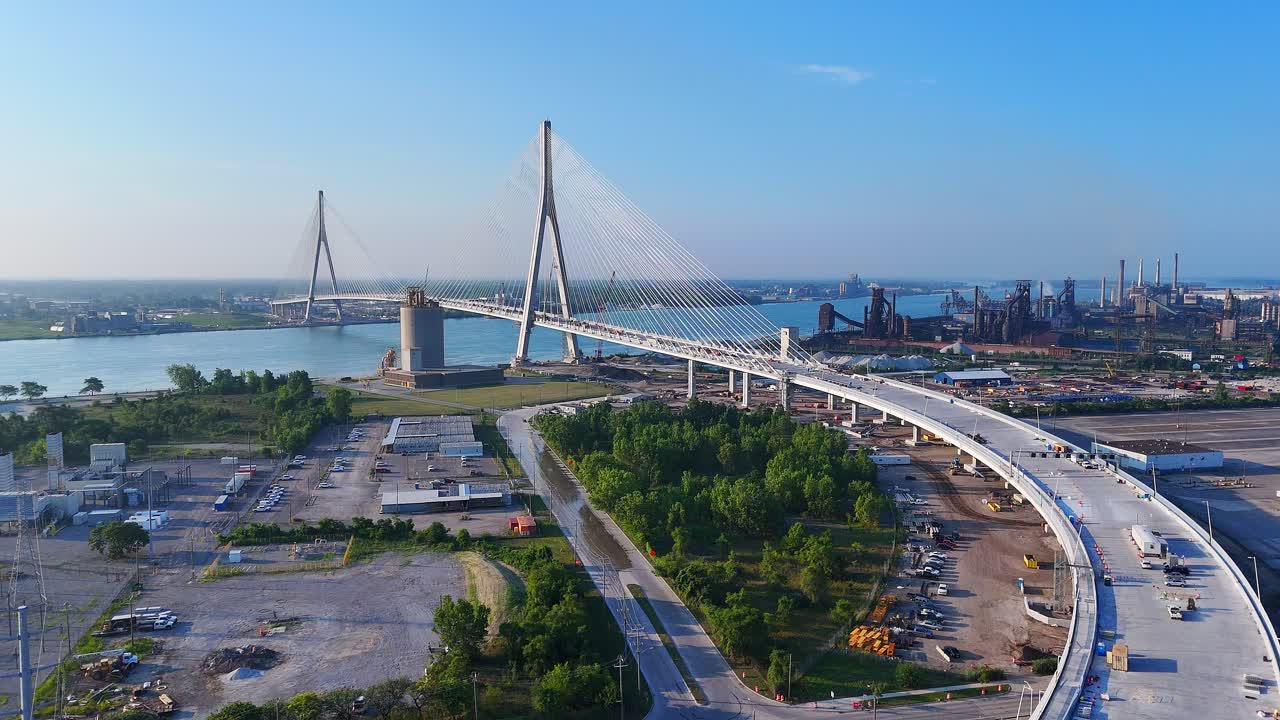 Gordie Howe Bridge Under Construction Over Detroit River With Zug Island in background