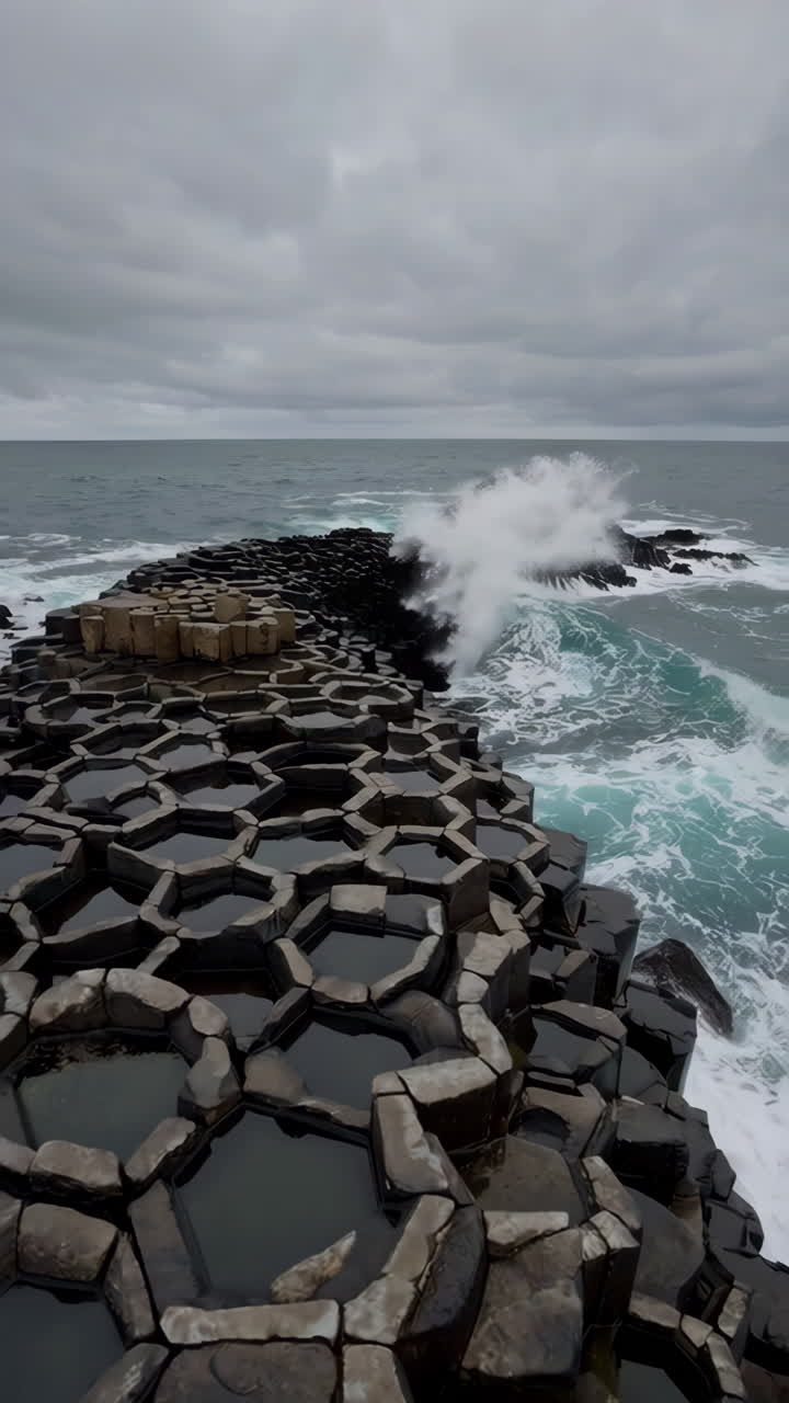 Dramatic Hexagonal Basalt Columns on a Stormy Coastline