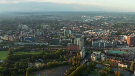 circling-pan-aerial-shot-over-Reading-UK-at-sunrise